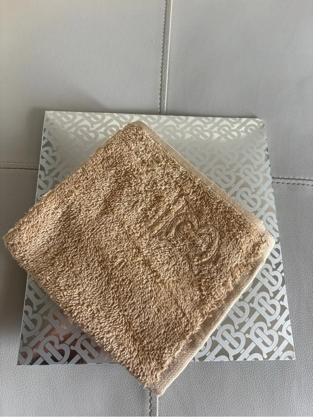 Burberry Beige Embossed Monogram Wash Cloth